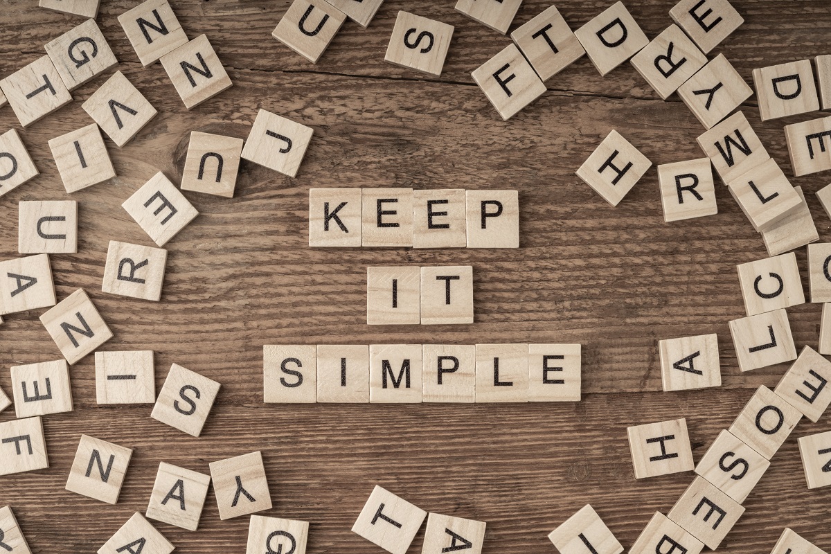 Keep it simple written with wooden letters