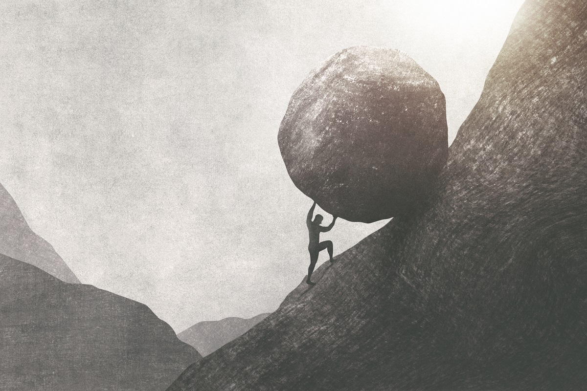 Sisyphus pushing boulder up mountain